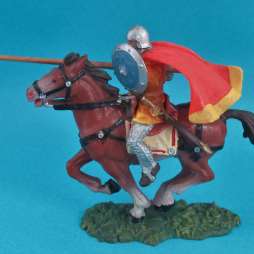 8867  Cavalier jouteur avec bouclier rond et cape sur cheval 2 (II).